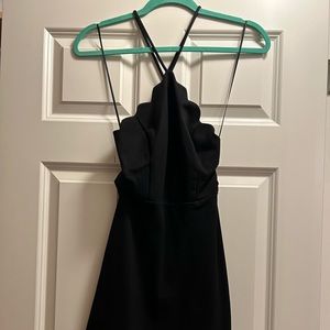 Cute Little Black Dress with an open back and scalloped details!